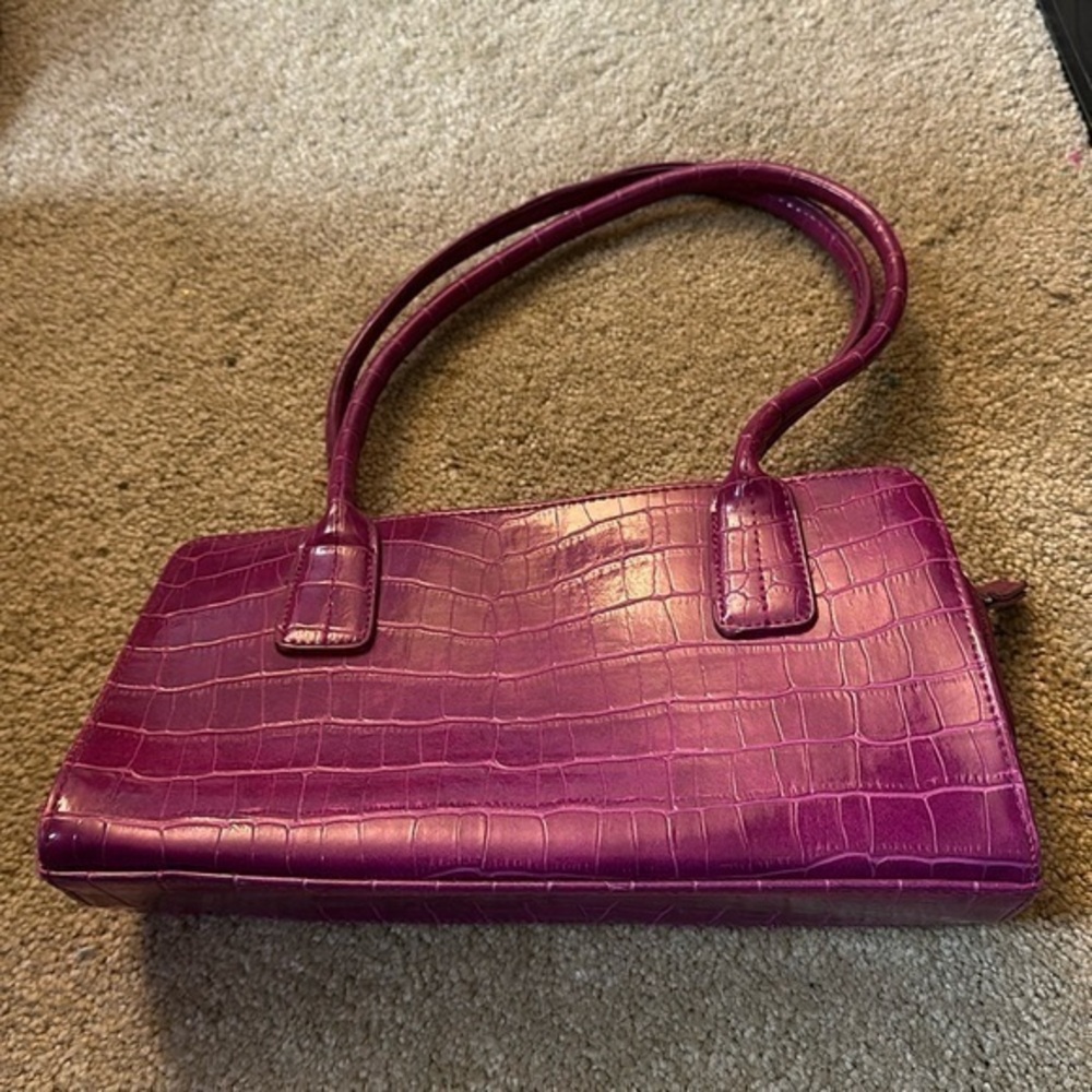 Purple alligator print handbag,